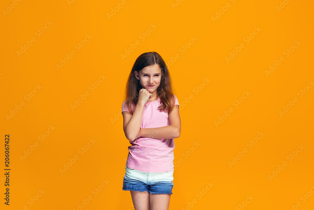 Obraz premium Young serious thoughtful teen girl. Doubt concept.