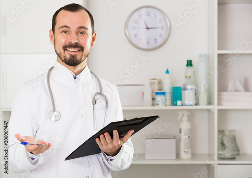Male doctor waiting for patients