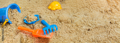child playing in the sandbox