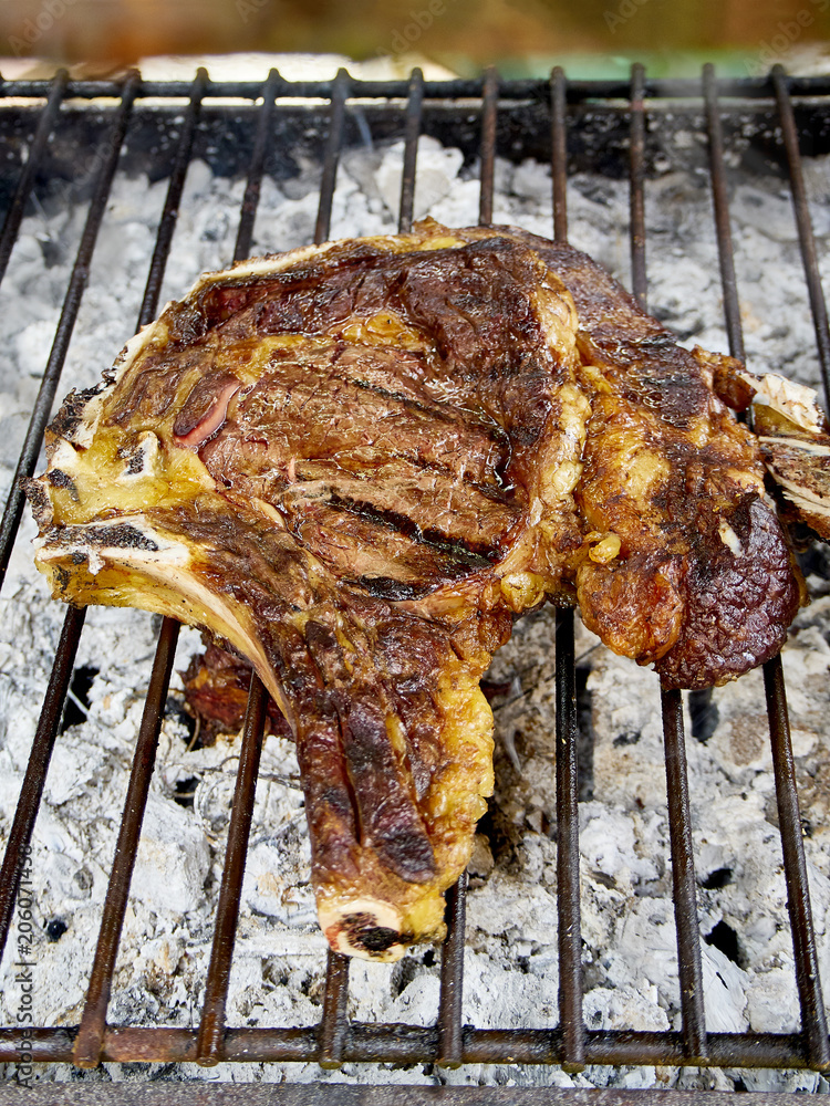 Spanish beef Chuleton, also known as Bonein Ribeye steak, Cowboy steak, Prime Rib steak or Veal