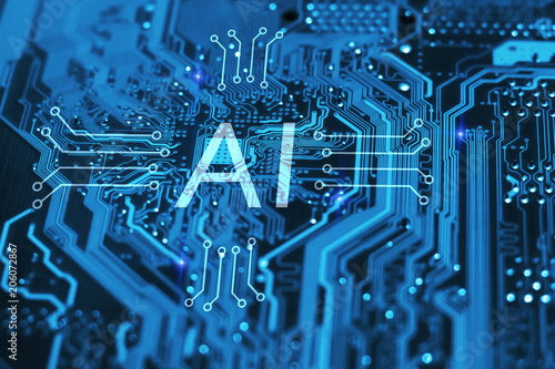 Artificial intelligence and machine learning concept. AI symbol on integrated circuit on blue background.