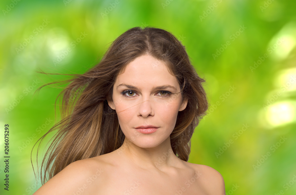 Beautiful young woman with green bamboo leaves Beautiful young woman with green bamboo leaves