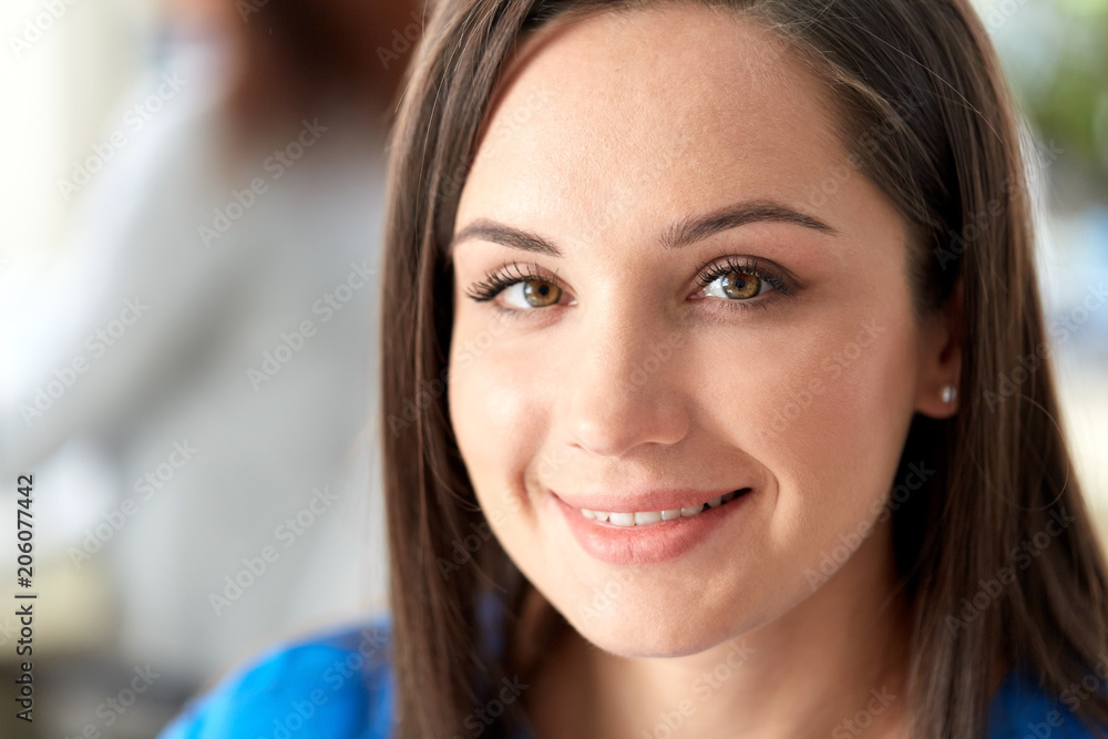 people, emotion and facial expression concept - portrait of happy smiling young woman people, emotion and facial expression concept - portrait of happy smiling young woman