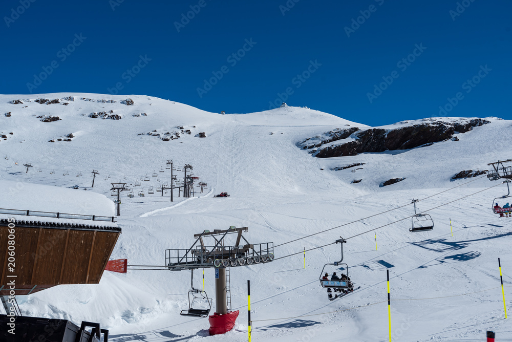 Ground view of Sierra Nevada mountain resort pistes, from 