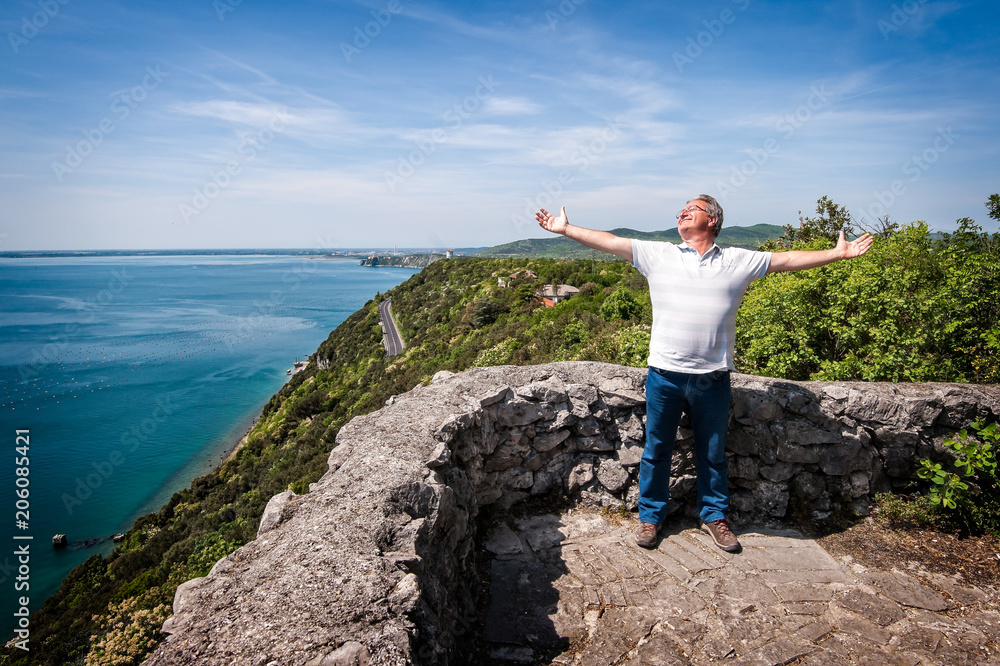 Conceptual image with very happy mature man in nature background. Conceptual image with very happy mature man in nature background.