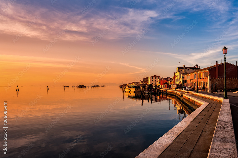 Romantic sunset on the Venice lagoon. Island of Pellestrina.
