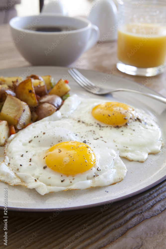 Fototapeta premium Fried Eggs and Hash Browns