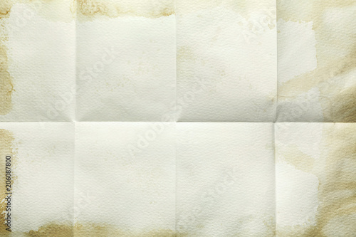 Empty sheet folded in eight, old paper with stained edges