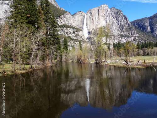 Yosemite Waterfall reflected on the surface of a lake  US National Park