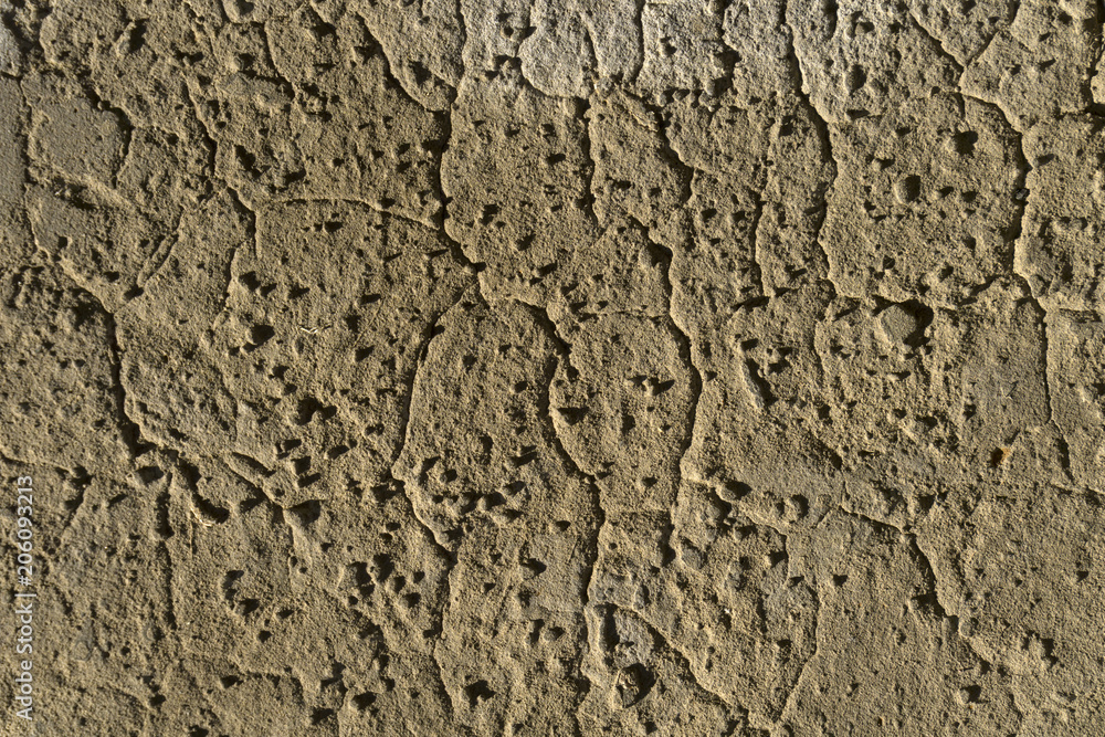 background, texture - brown clay wall with bumps and cracks background, texture - brown clay wall with bumps and cracks
