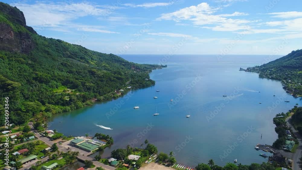 Aerial view of Cook's Bay and Paopao town - Moorea island, South Pacific Ocean, French Polynesia landscape from above, 4k UHD Aerial view of Cook's Bay and Paopao town - Moorea island, South Pacific Ocean, French Polynesia landscape from above, 4k UHD