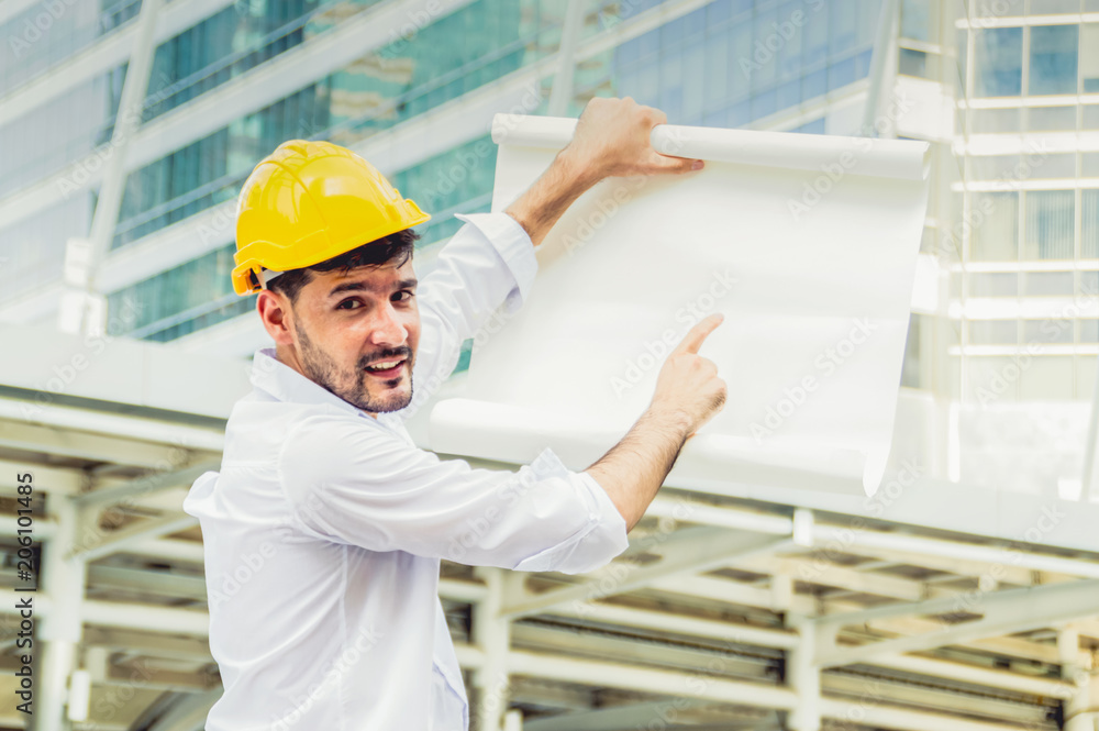 Professional engineers, young men and young women are planning construction. Professional engineers, young men and young women are planning construction.