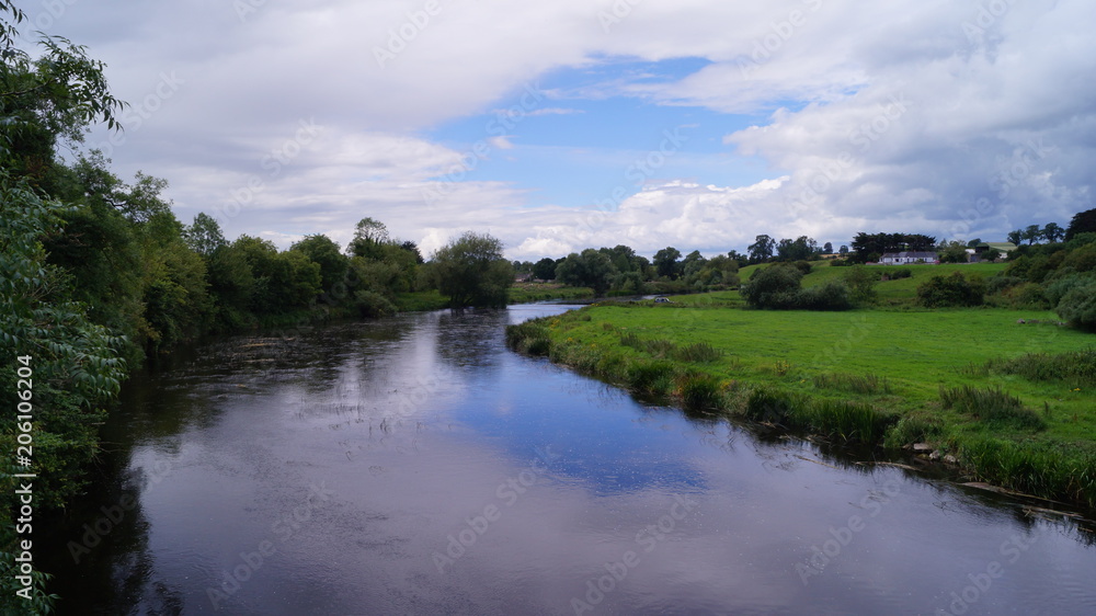 landscape with river and irish blue sky landscape with river and irish blue sky