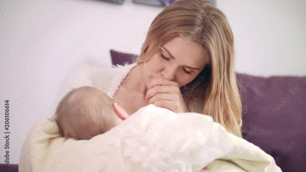 Beautiful woman breast feeding baby. Portrait of mother breastfeeding baby and kissing her. Cheerful mom enjoy breastfeeding. Little baby breast feeding and sleeping. Sweet motherhood Stock-video | Adobe Stock