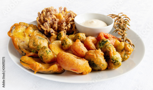 Фотография fried breaded vegetables and vegetables in batter with mayo