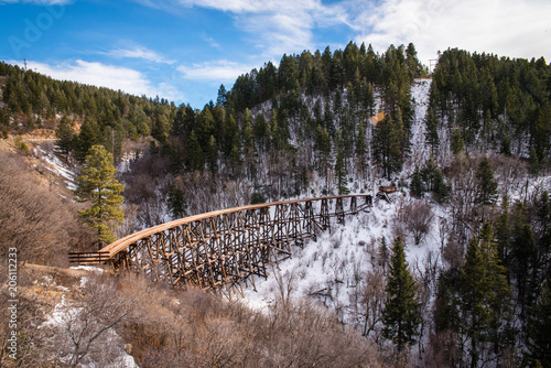 An old wooden trestle running through the mountains in New Mexico. 