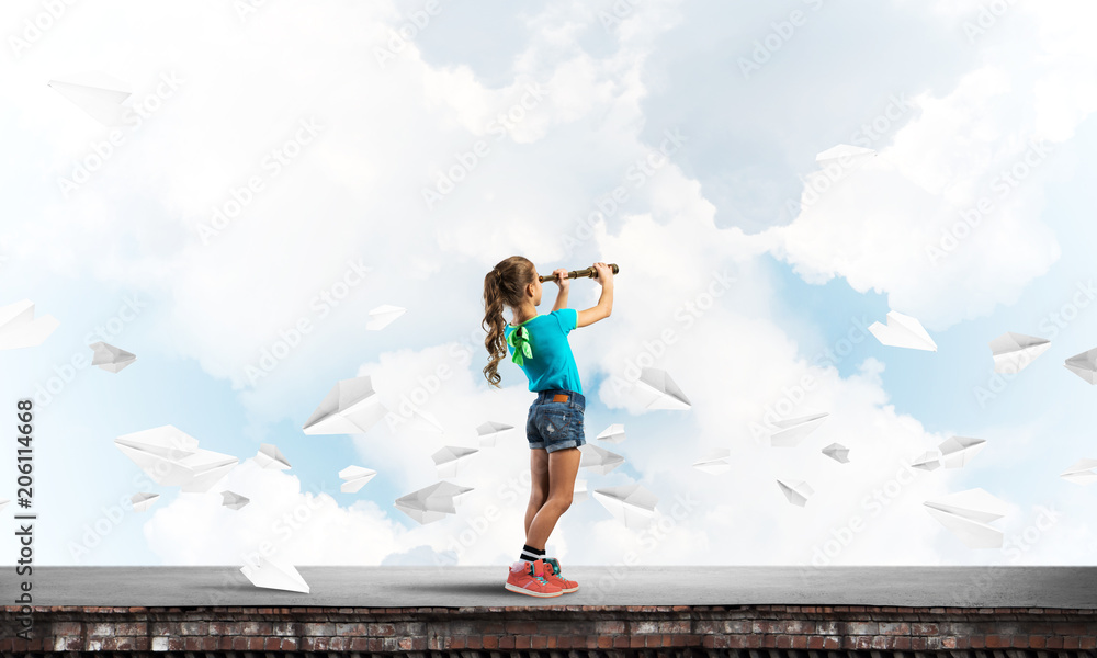Concept of careless happy childhood with girl exploring this world Concept of careless happy childhood with girl exploring this world