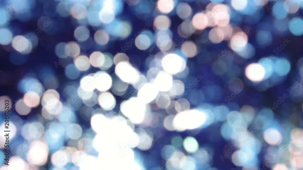 Defocused bokeh lights and lens flare, abstract light background.
Defocused bokeh lights and lens flare, abstract light background.