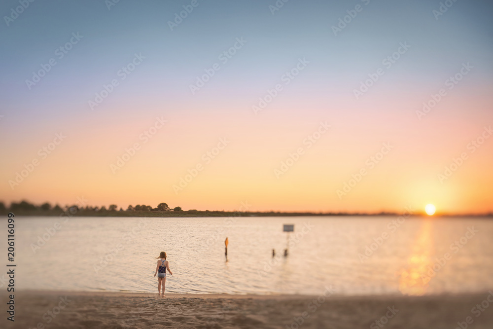 A Young Girl Looking at the Ocean, water, pretty sky, sunset