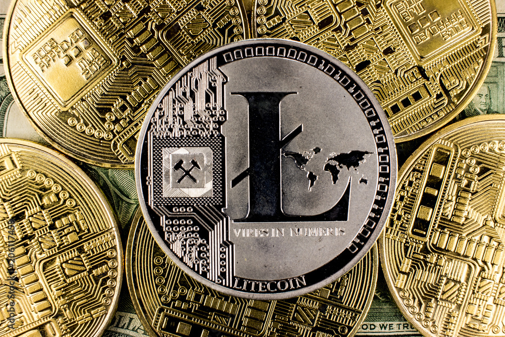 Cryptocurrency Litecoin. Golden bitcoins background