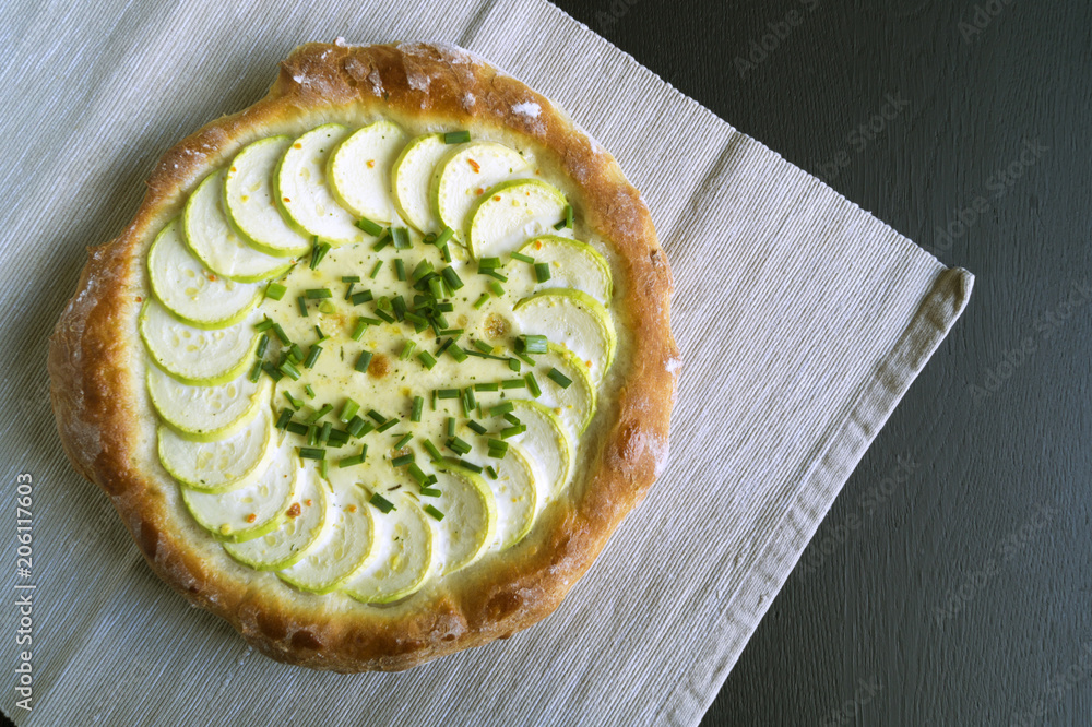 Homemade rustic pie with zucchini and green onions. Homemade rustic pie with zucchini and green onions.