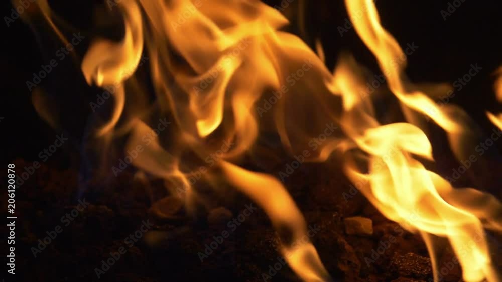 Professional video of Fire flames on the darkness in Slow motion 180fps Professional video of Fire flames on the darkness in Slow motion 180fps
