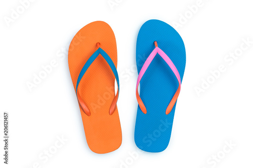 Blue and Orange flip flops isolated on white background. Top view