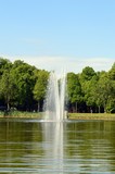 natural lake with fountain in the middle