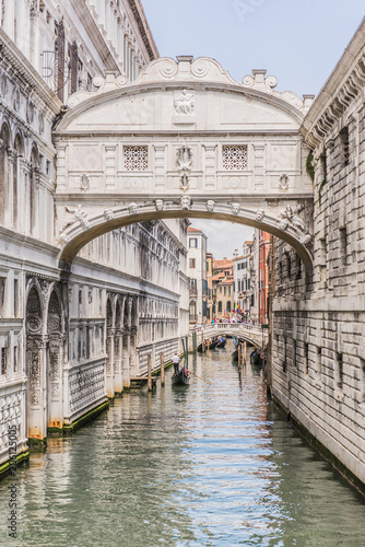 View of the Bridge of Sighs (Ponte dei Sospiri) and the Rio de Palazzo o de Canonica Canal from the Riva degli Schiavoni in Venice, Italy. The Ponte de la Canonica is visible in background.
