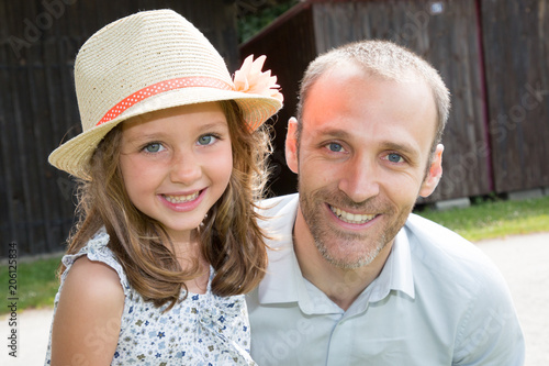 Happy father and little blond daughter outdoors portrait © OceanProd