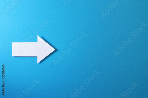 one solid arrow on blue background