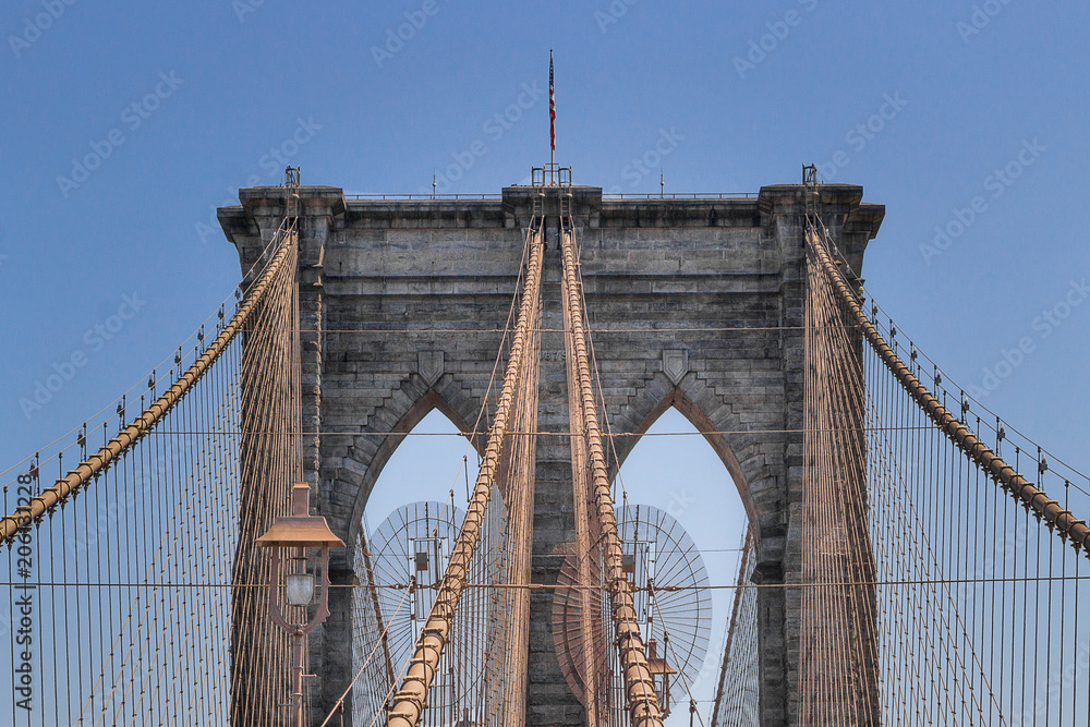 Fototapeta premium The Brooklyn Bridge above a blue sky