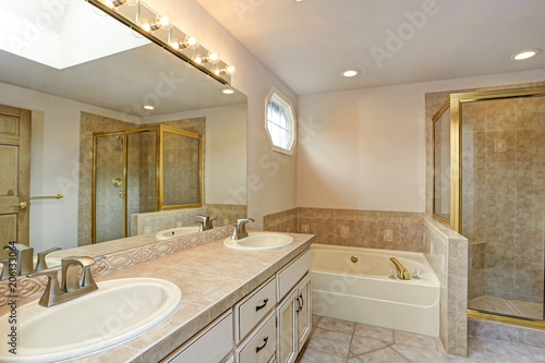 Master Bathroom with double vanity cabinet and shower.