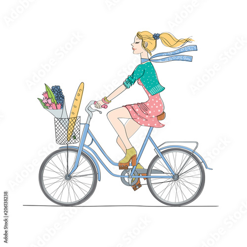 bicycle/A girl goes on a bicycle.