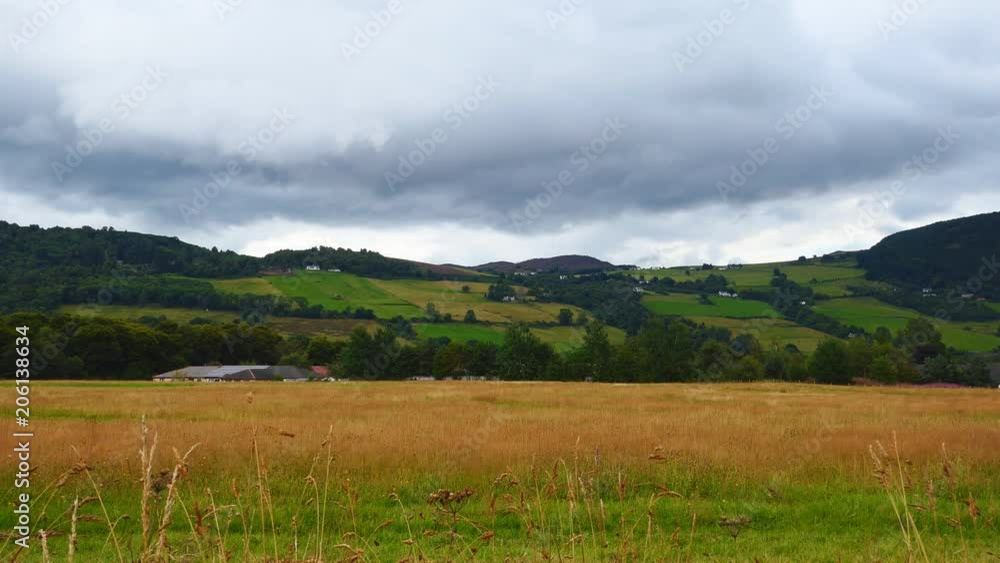 Dramatic clouds over meadows and fields. Scotland. Dramatic clouds over meadows and fields. Scotland.