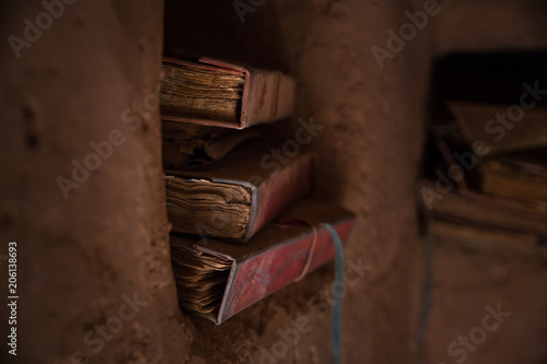 Ancient arabic scripture in wall cave in historic house at world hertiage site Tichitt, Mauritania