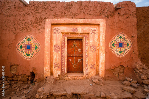 Famous ancient arabic door paintings at medieval bricked house in World Heritage Site Walata, Mauritania