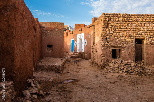 Famous ancient arabic door paintings at medieval bricked house in World Heritage Site Walata, Mauritania