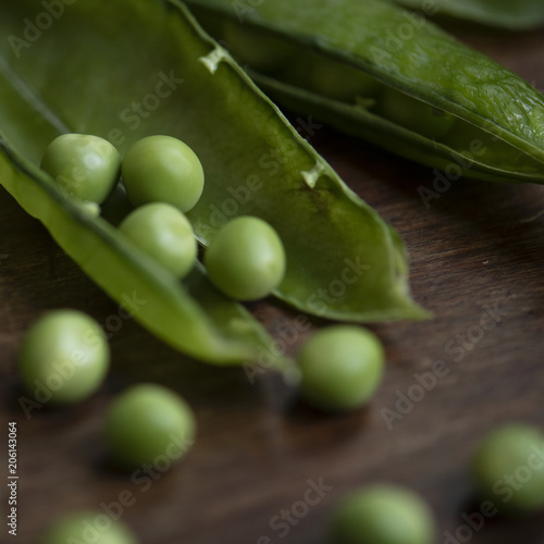 Close up of a green pea pod food photography recipe idea