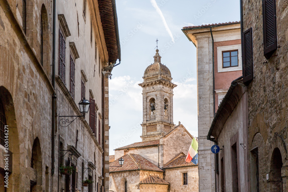 urban scene with historical buildings in Tuscany, Italy