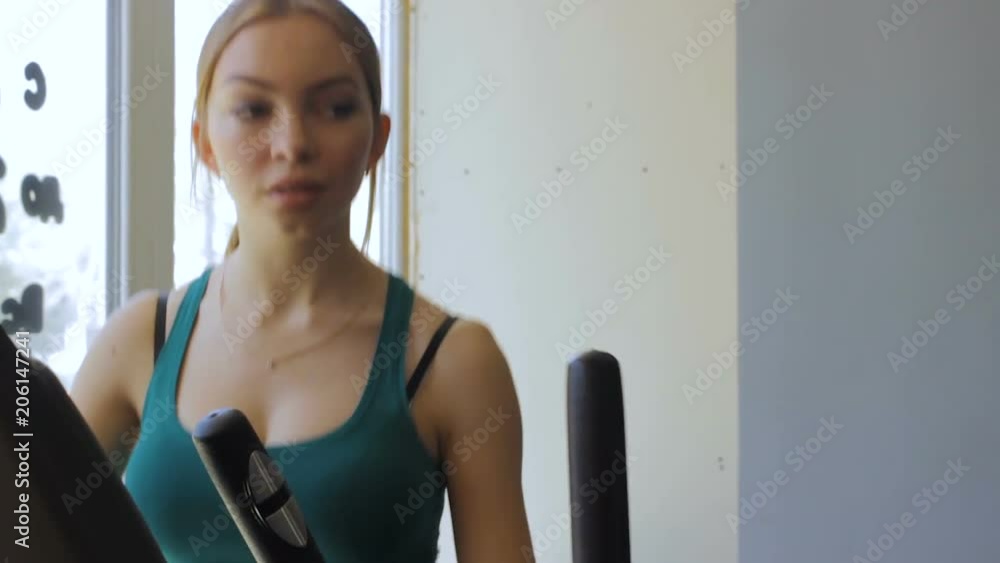 Pretty girl, sports club, fitness training, daylight Pretty girl, sports club, fitness training, daylight