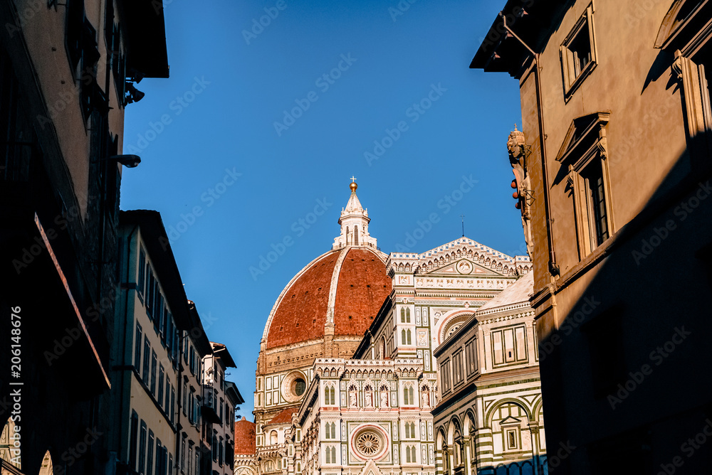 historic buildings and famous Basilica di Santa Maria del Fiore in Florence, Italy