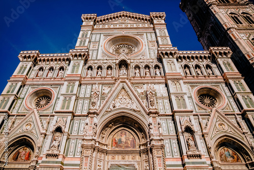 low angle view of famous Duomo Cathedral with Giotto Bell Tower in Florence, Italy © LIGHTFIELD STUDIOS