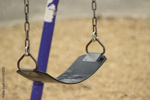 Swing Set at a school playground, slective focus photo