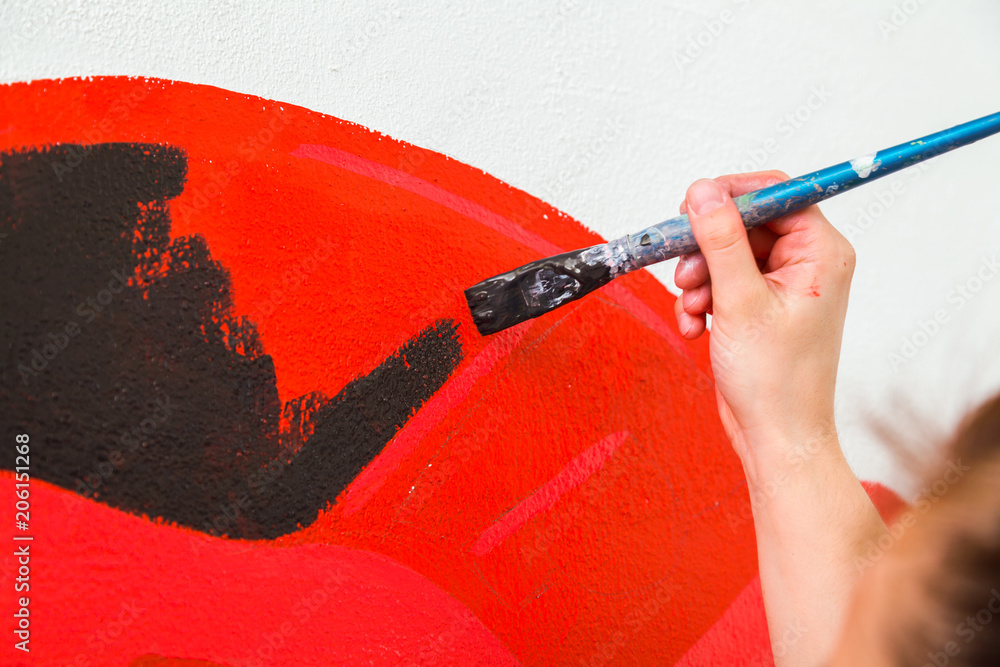 Fototapeta premium Woman paint little car