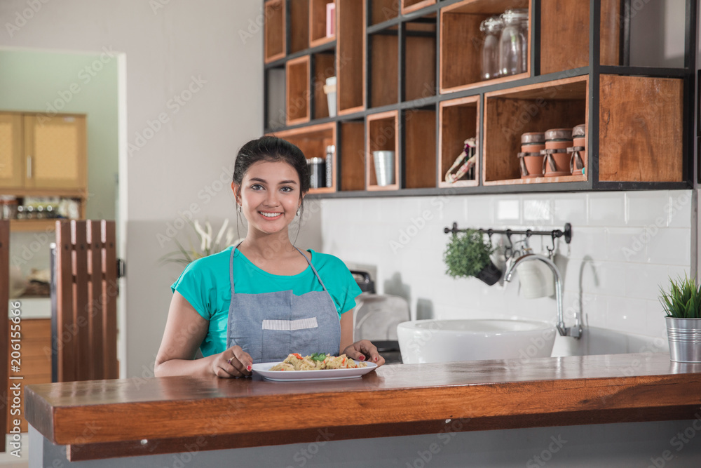 Obraz premium house wife preparing food for lunch
