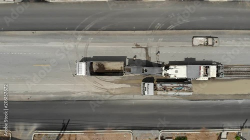 Asphalt grinding machine operator job at replacement construction road site