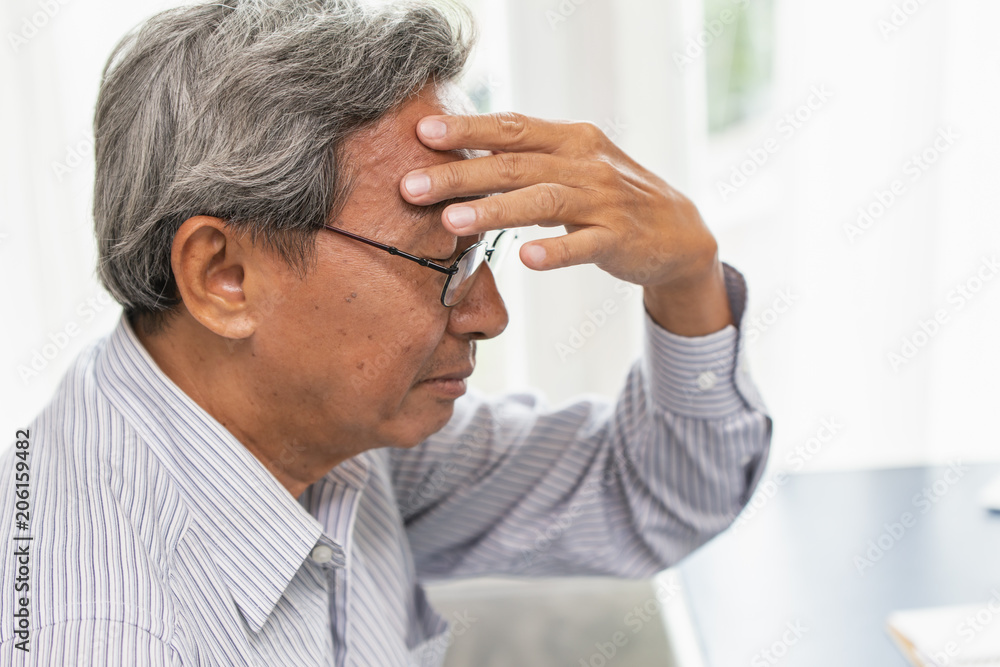 Asian elder headache pain suffer from stress side view. Asian elder headache pain suffer from stress side view.