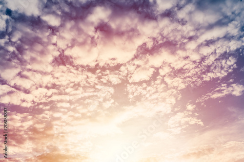 beautiful puffly cloud twilight sky with sun bright