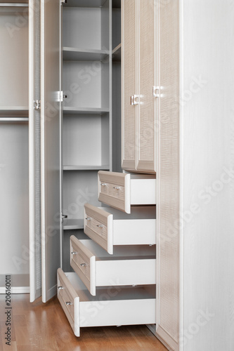 modern empty wooden wardrobe interior design in bedroom